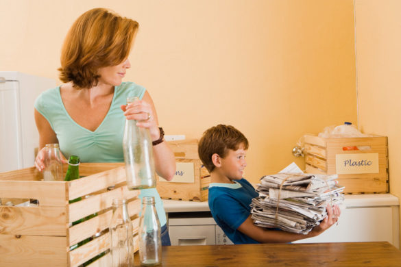 Woman and boy recycling