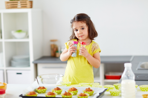 Girl making cupcakes