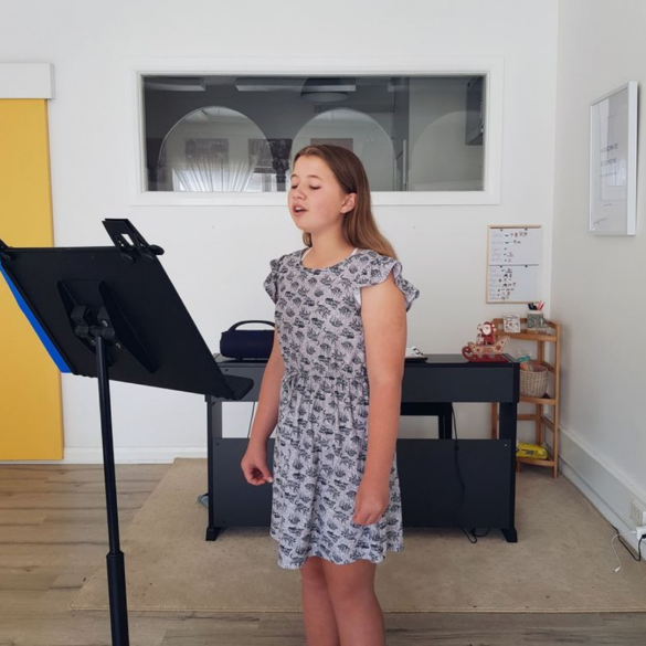 Young girl singing at Sutherland Shire Singing
