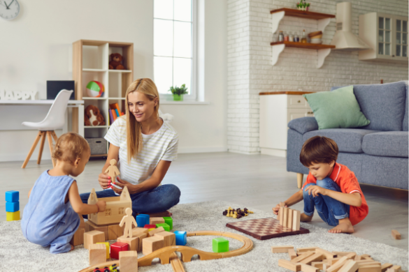 mum playing blocks with children