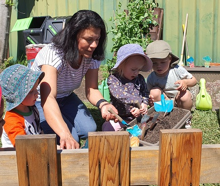 Sutherland Shire Childrens Services Family Day Care Worker Magda in the garden with kids