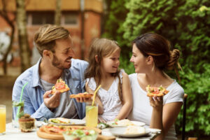 Happy family eating in a restaurant Outdoors, Family time, Tasty, Togetherness