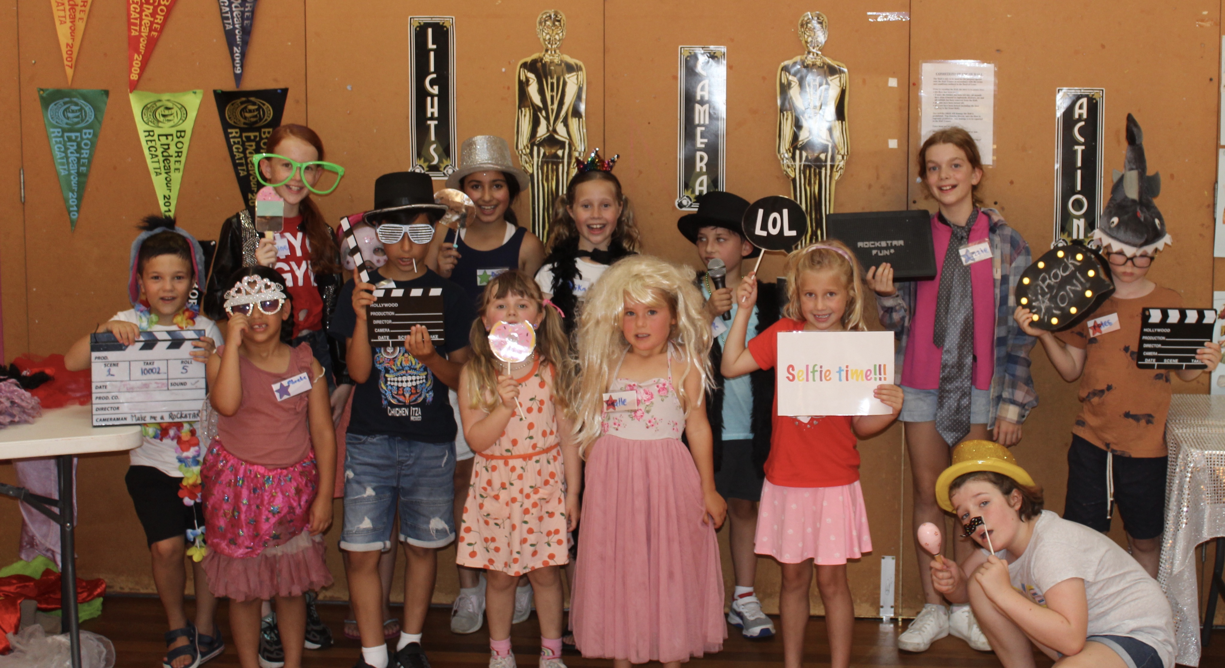 Make Me a Rockstar holiday workshop, group of kids with props