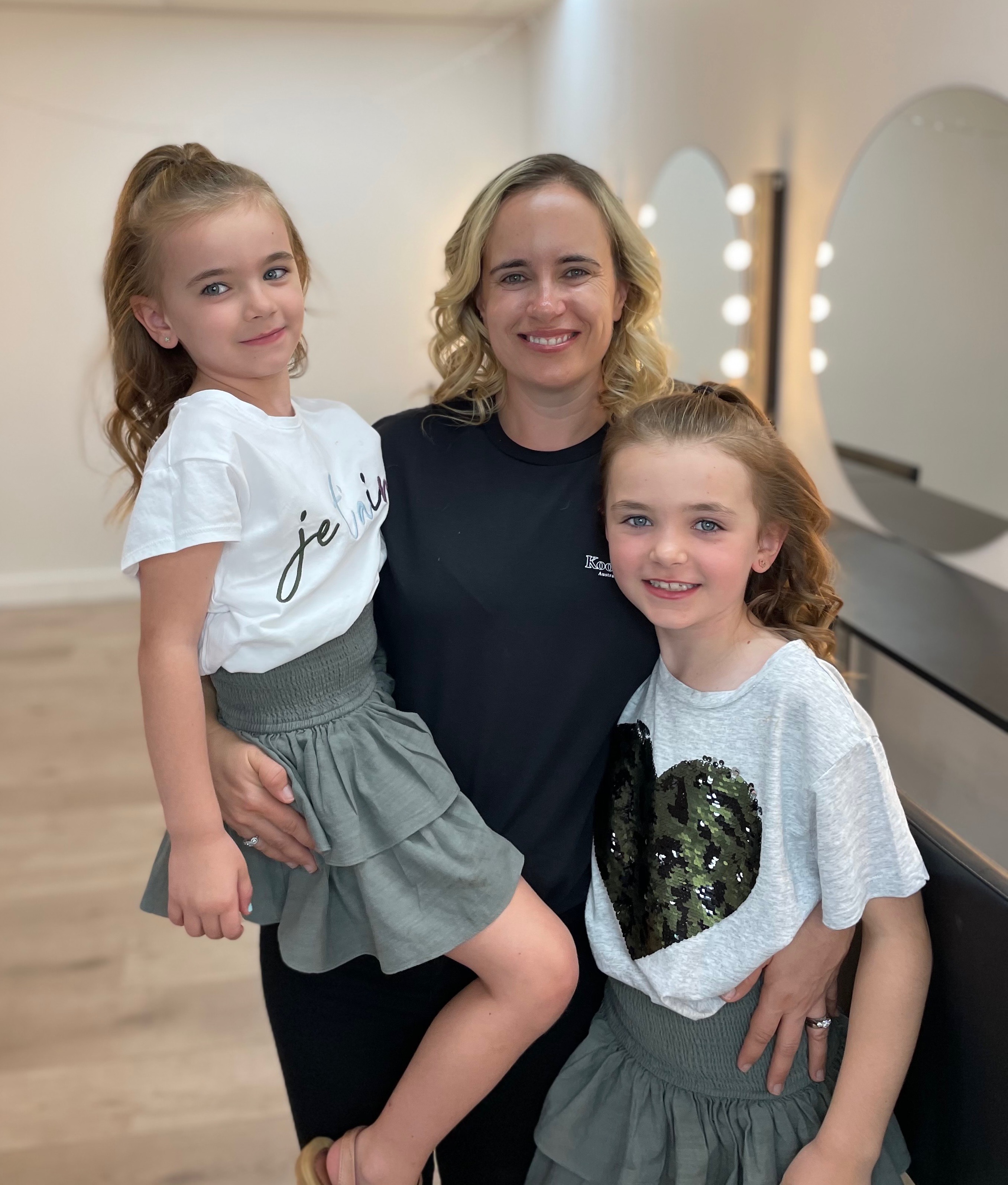 mum and daughters at the bridal bar